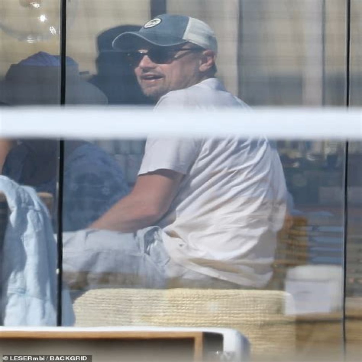 bitchy | Leonardo DiCaprio and Camila Morrone enjoy a day at the beach with Tobey Maguire and Lukas Haas